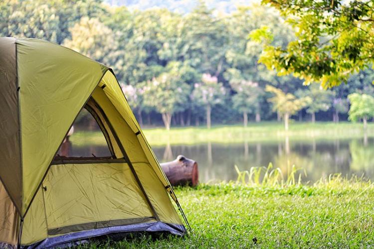 Tent set up by a lake