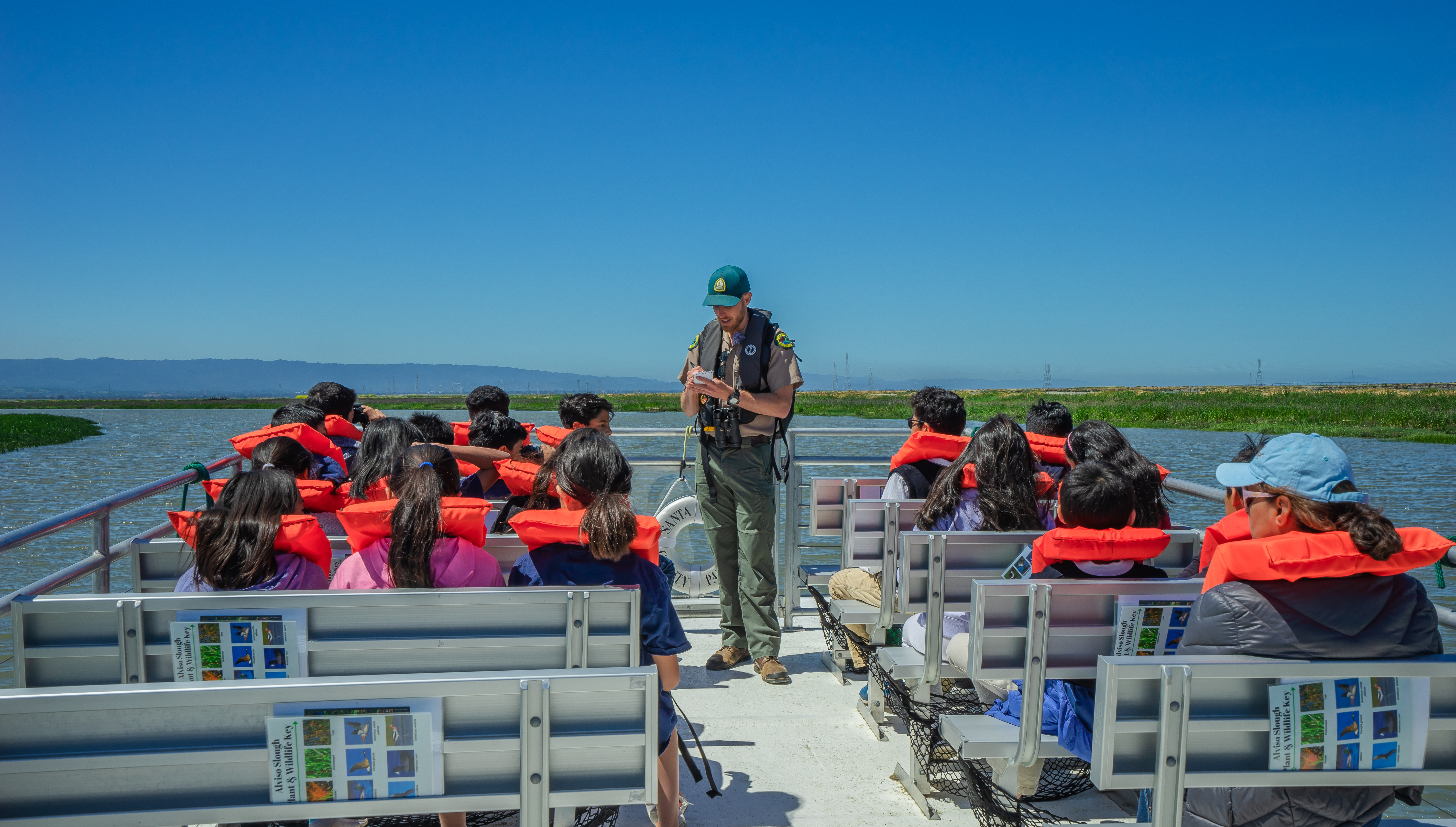 Alviso interpreter on boat with students
