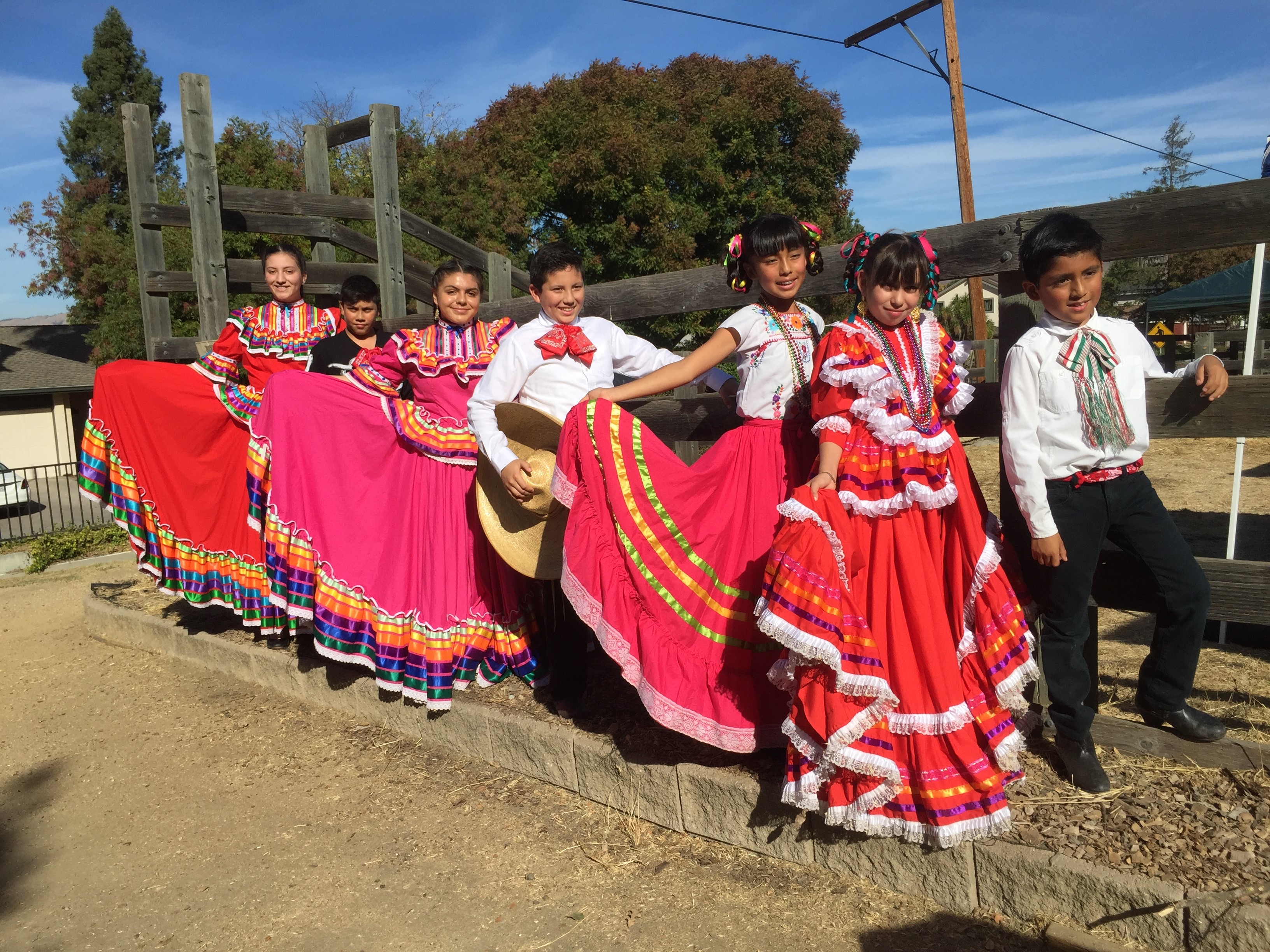 Dancers from the group El Grito de Cultura pose for a photo