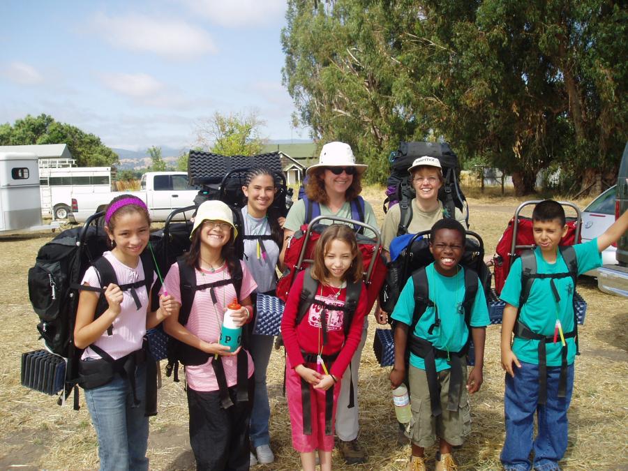 Group of youth geared up for backpacking