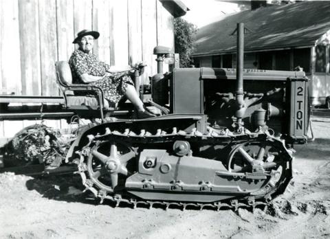 Leora Cottle Cobb on her 2-Ton Caterpillar tractor, 1946.