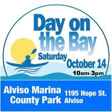 image for day on the bay, saturday, october 14, 2023, 10 am to 3 pm at alviso marina county park, 1195 hope street, alviso. there are background images of a kayaker, sun, mountains. 