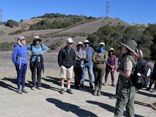 Park Interpreter talks to hike participants. 